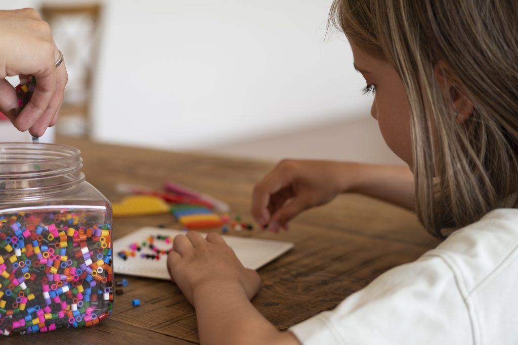 girl being creative at home