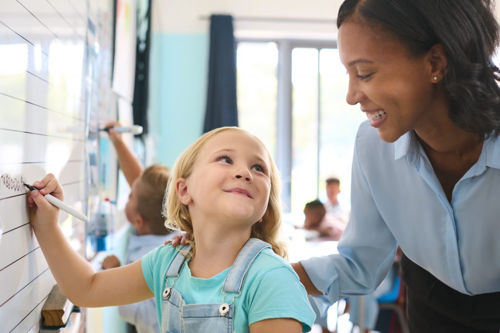 tutor and child in elementary school