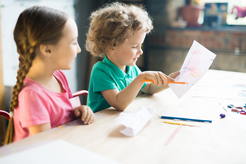 children drawing together