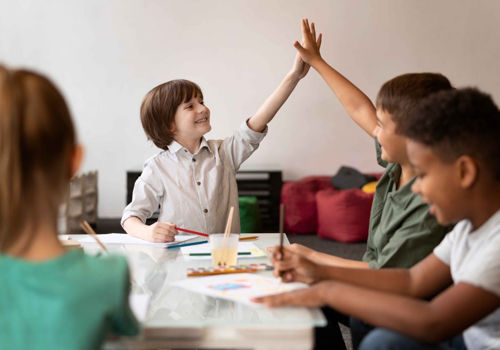 group of kids drawing together