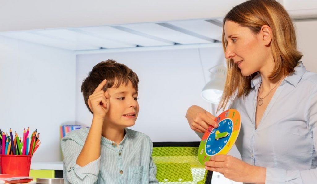 Child learning on weather chart