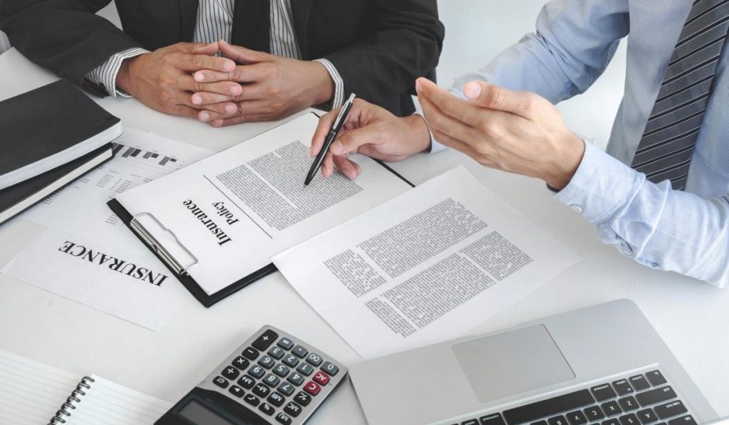 insurance documents being completed