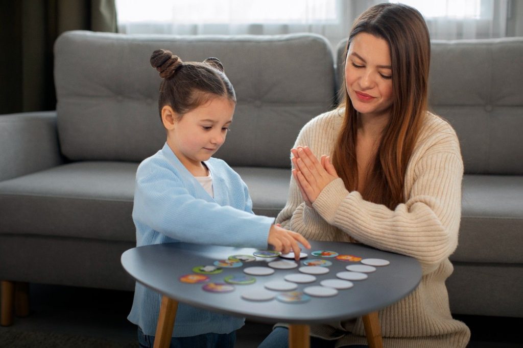 Mother and child playing a game together