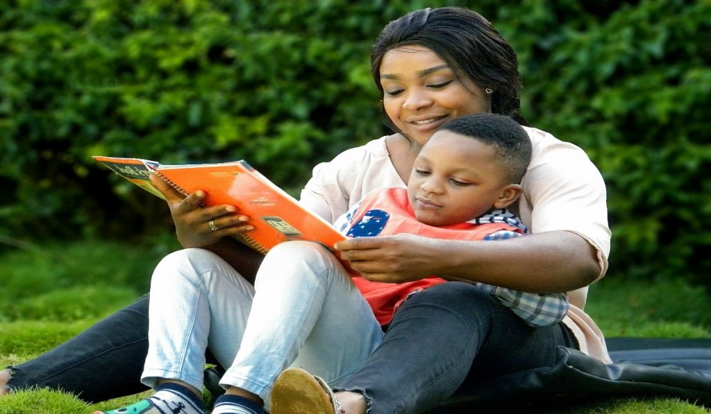 parent and child reading together