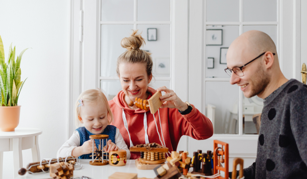 Parents playing with child