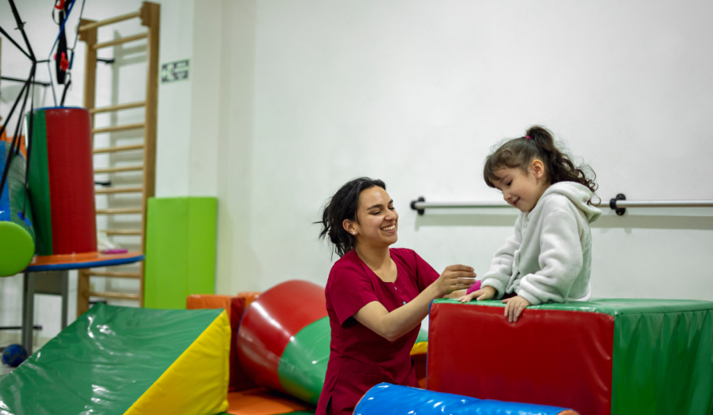 Child playing on soft climbing blocks