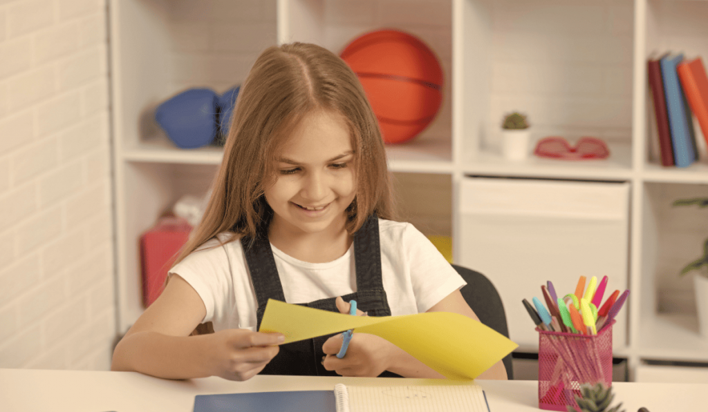 Girl cutting paper