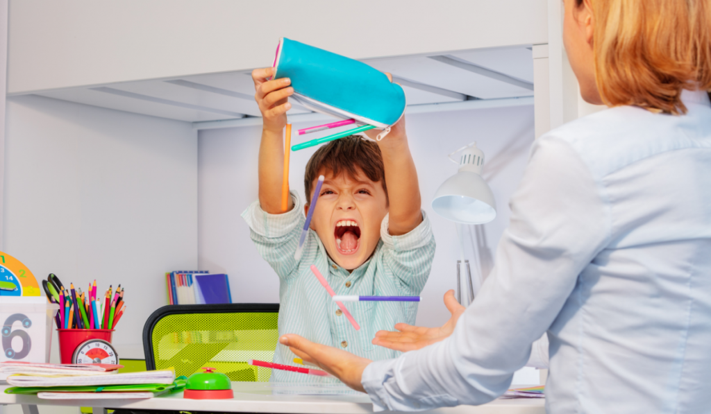 Child throwing out pencil case